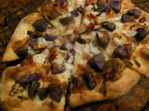 Blue potato, onion, bacon, and cheese